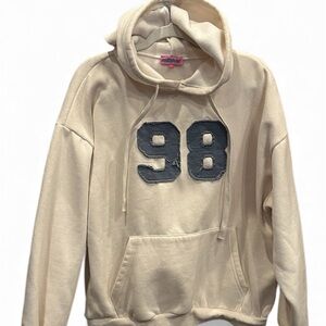 Edikted Cream Hoodie with Bold Number Design